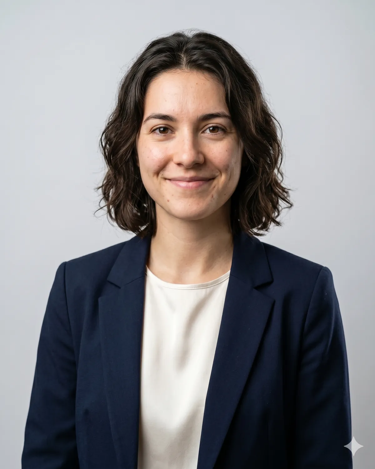 AI headshot prompt example: Clean corporate headshot (color) — Female LinkedIn portrait, generated with Gemini (nano banana)